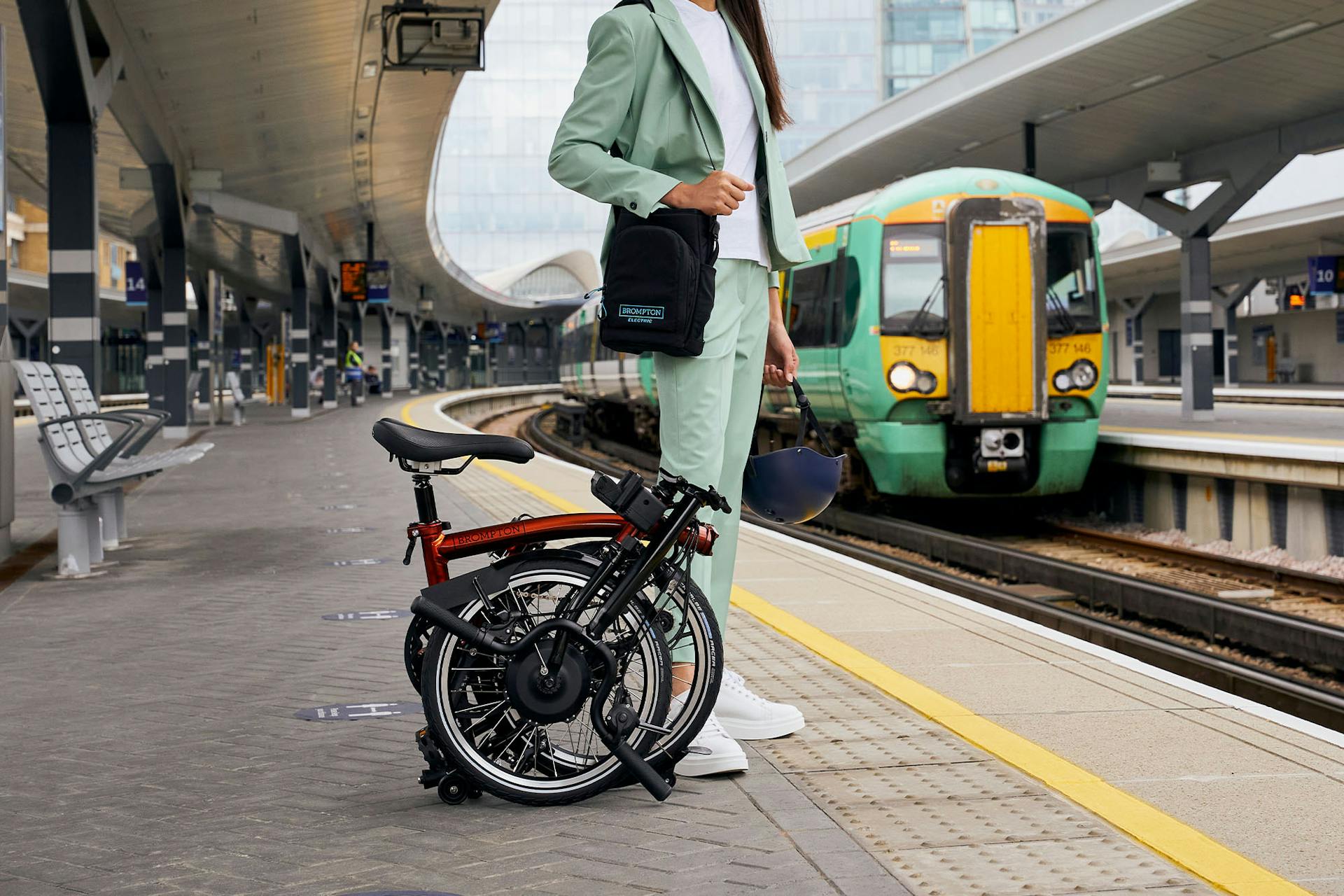Brompton electric c line folded in train station